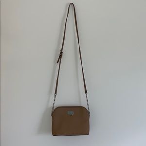 Tan crossbody Michael Kors purse